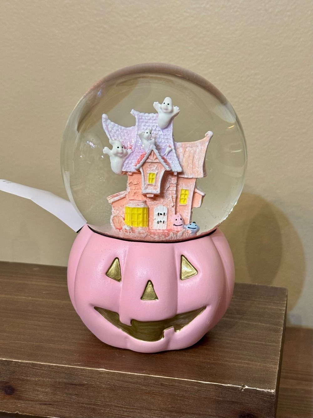 Pink Pumpkin Jack-O'-Lantern Ghost House Snow Globe